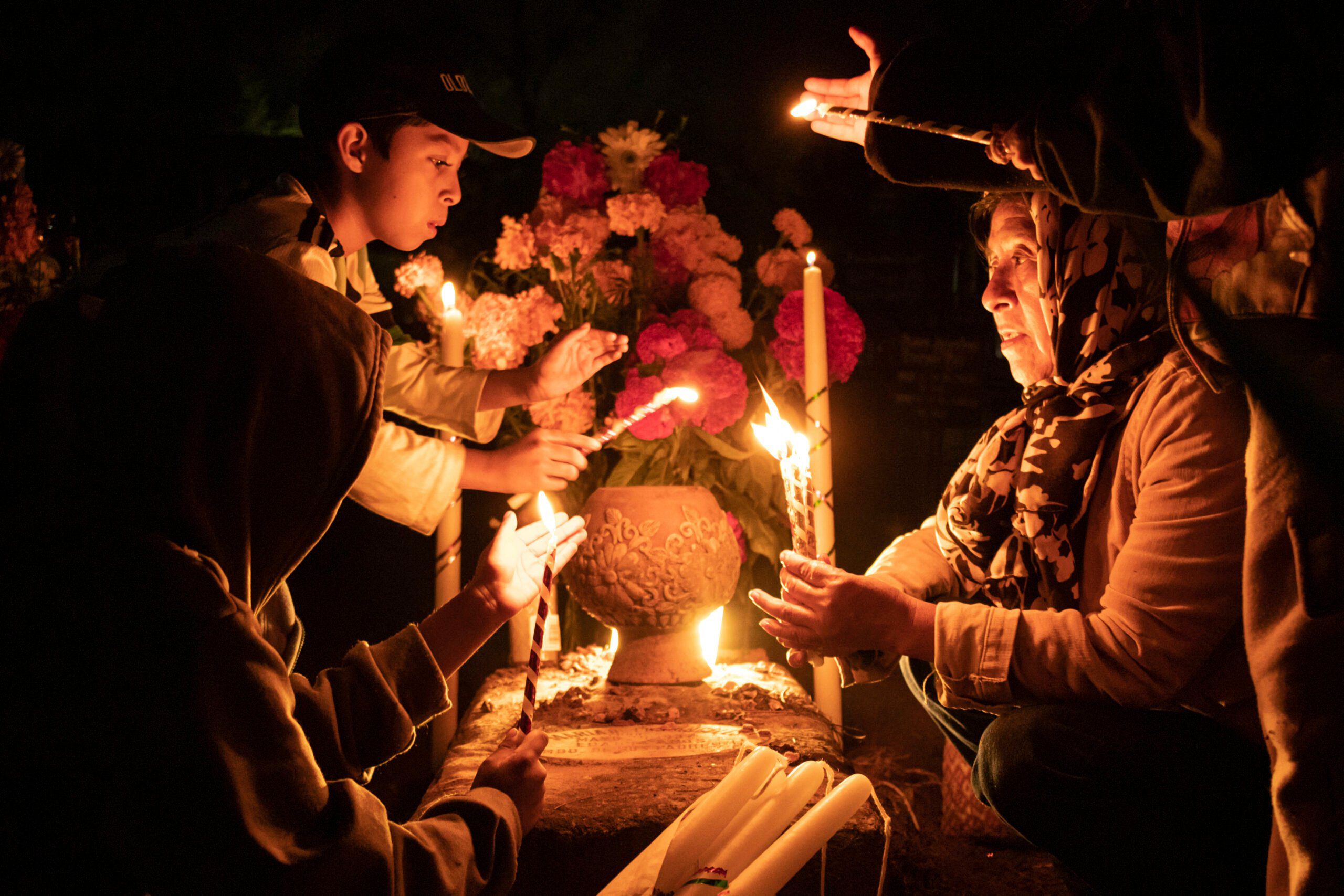 With flowers, altars and candles, Mexicans are honoring deceased